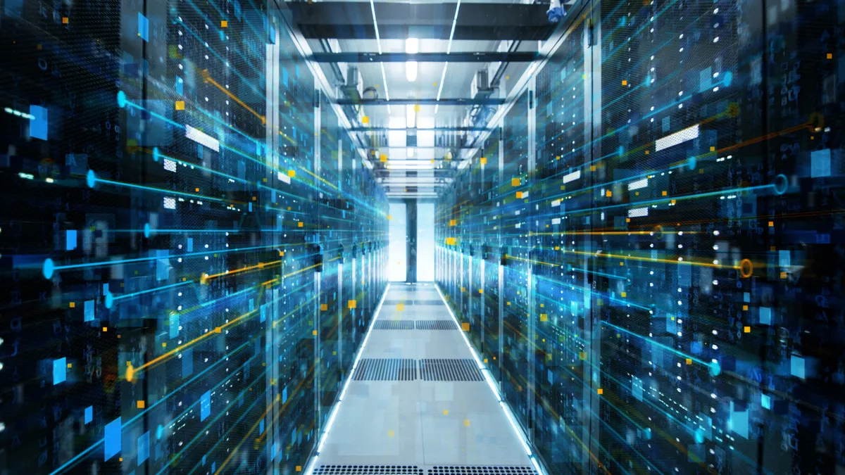 EDV-Service Limacher – EDV-Hardware, Software Dienstleistungen – Eine Aufnahme eines Ganges in einem in Betrieb befindlichen Rechenzentrum, gefüllt mit Rack-Servern und Supercomputern, mit einer Visualisierung einer Internetverbindung